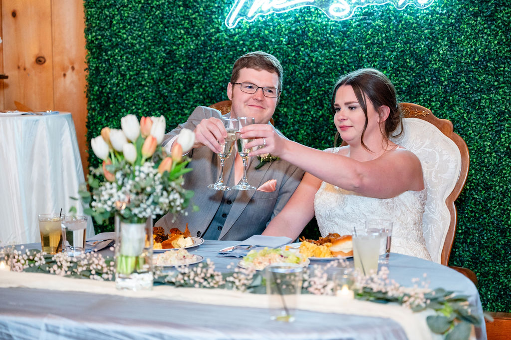 Toasting-Bride-and-Groom-Reception-at-White-Chimneys-Estate-Megan-Hoffer-Photography